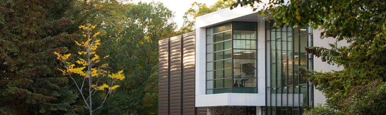 Windows of Au Sable Hall at sunrise